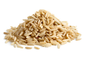 Pile of long grain brown rice isolated on white. Organic Brown Rice Dosa Batter by Dream4Health