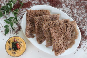 Instant Finger Millet Dosa, made with finger millet flour, curd and spices. Served with coconut chilly condiment Organic Finger (Ragi) Millet Dosa Batter by Dream4Health