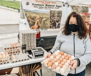 Egg Tray in Hands Farm Fresh Pasture-Raised Eggs (Non-GMO, Corn & Soy-Free) by Winters Fruit Tree