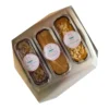 Three Butter and Rose mini cakes in a box: rose pistachio, coffee cardamom and mango cardamom. Flavors vary by baker's selection.